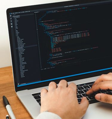 Web Developer at Design 380 coding a website