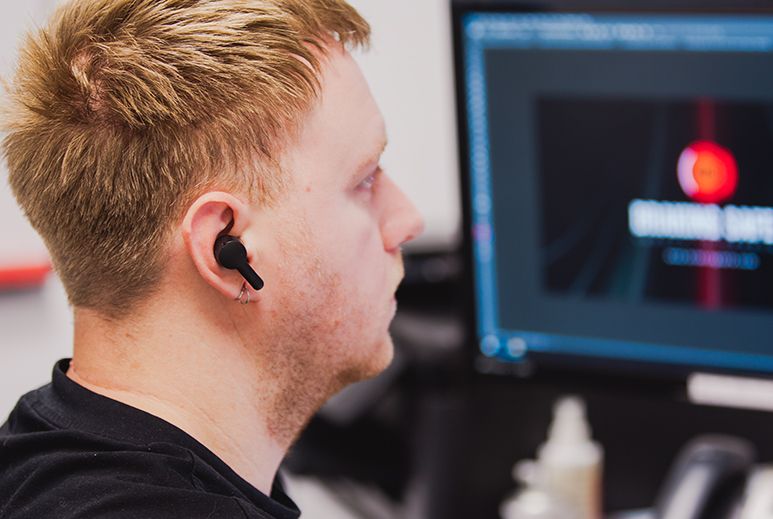 Web Developer at Design 380 coding a website